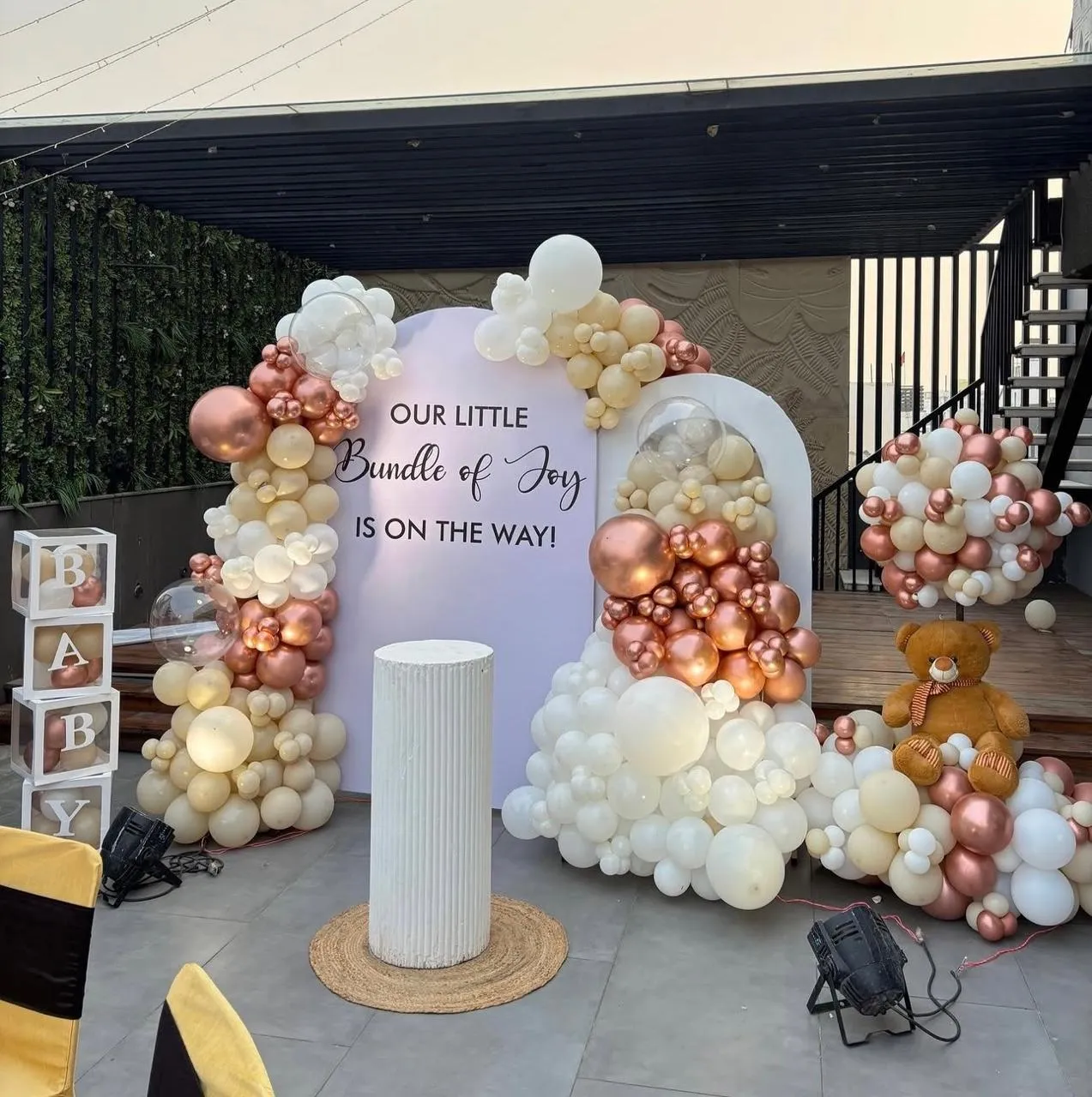 Baby Shower Theme with balloons, air balloon with teddy, welcome board, 4 LED lights and cake table.
