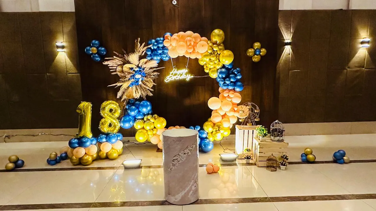 Blue and gold eighteenth birthday arch