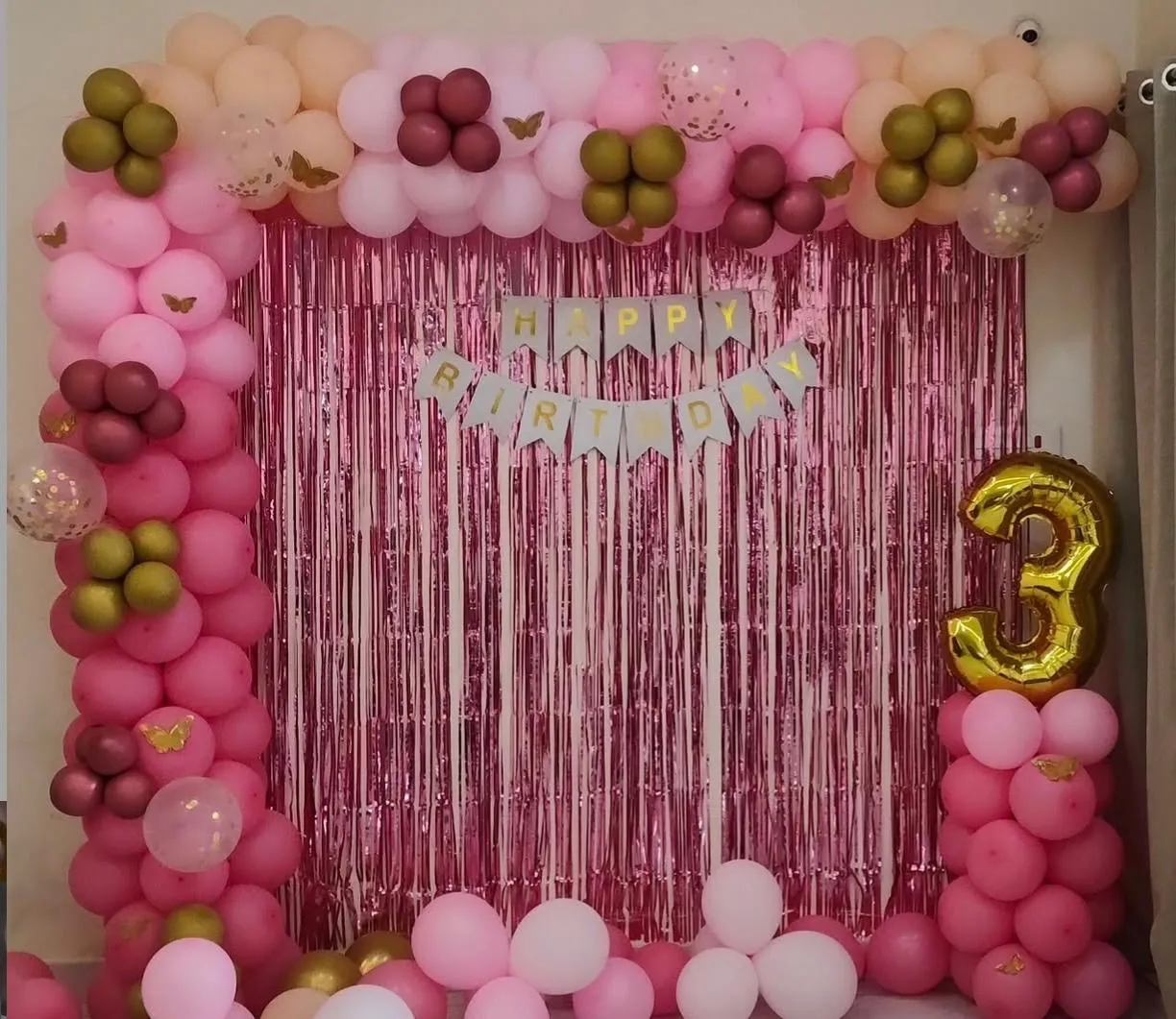 Wall Decor with balloons, foil letter, pink wall curtain.